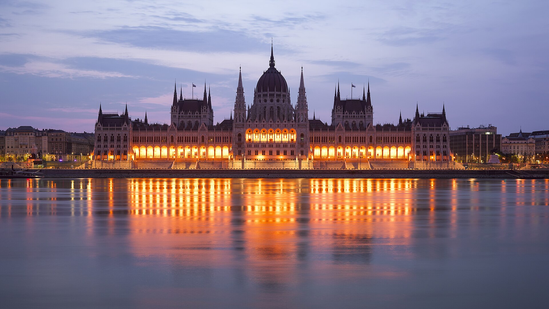 The Hungarian Parliament on the Danube at blue hour