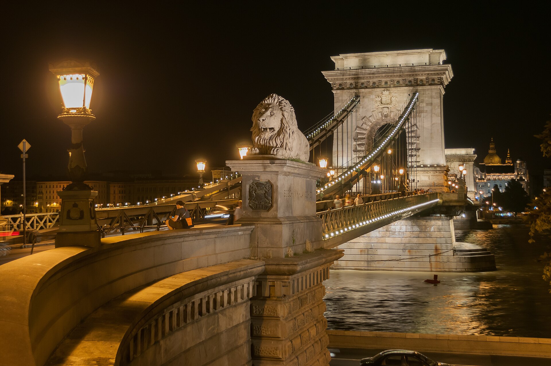 The Chain Bridge and its lion at night